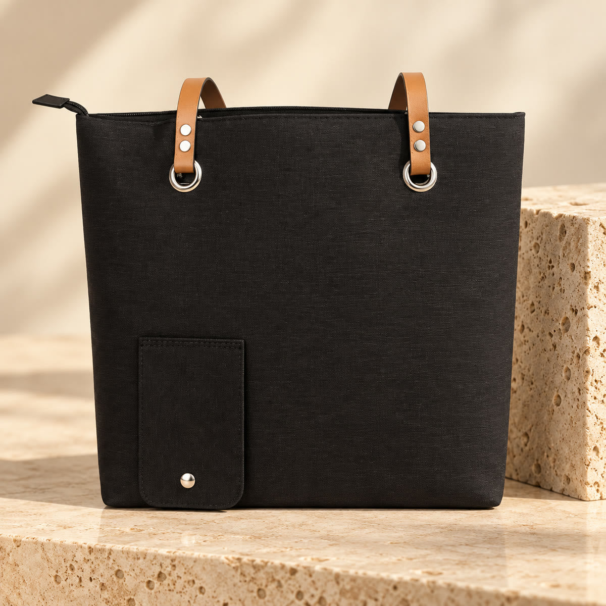 The Vinette Tote in Noir with tan leather-look straps